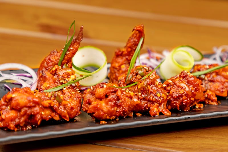 Golden crispy fried chicken with house seasoning